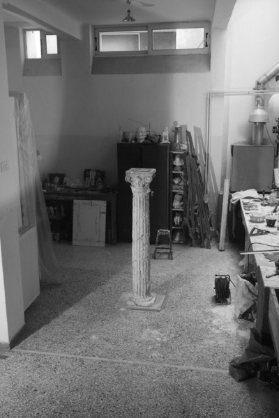 Man Standing, on a Column